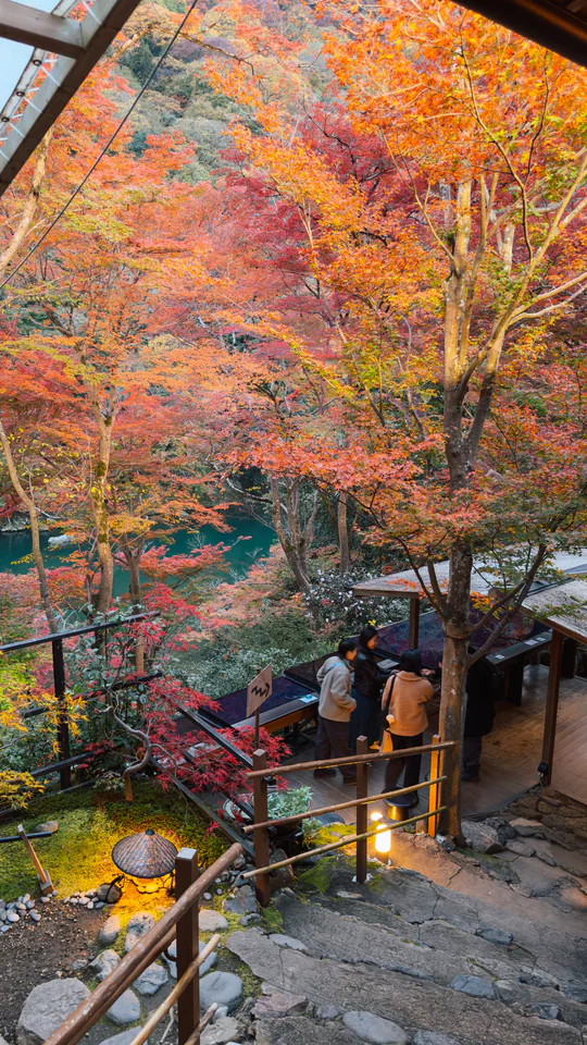 Breathtaking view of Arashiyama with vibrant autumn foliage in Japan.